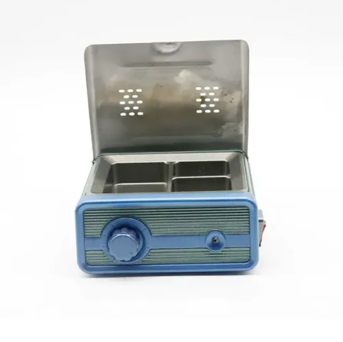 Wax Pot - مشمعة